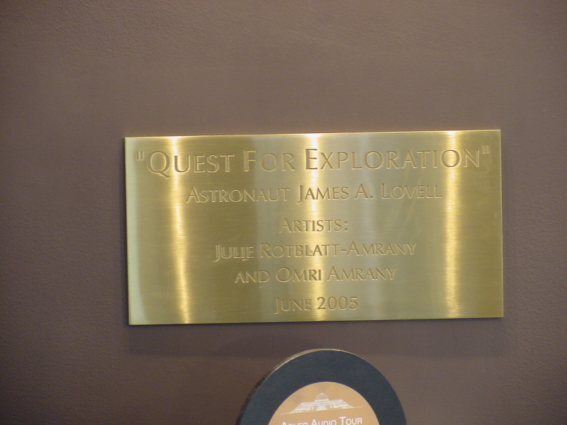 Sign accompanying Jim Lovell "Quest for Exploration" Statue at Adler Planetarium