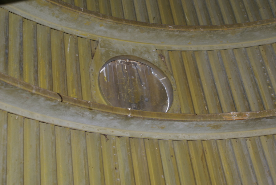 Round umbilical cover on aft skirt wall in Jupiter Tail Unit Interior at Air Power Park