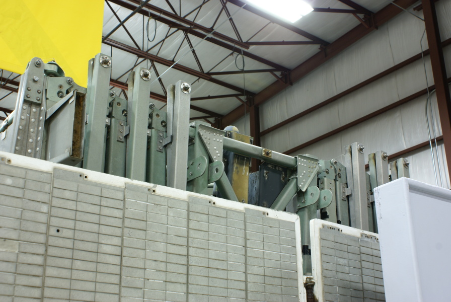 Center section, folded panels comprising wing assemblies, and the forward solar panels of the Pegasus Micrometeoroid Satellite at Air Zoo