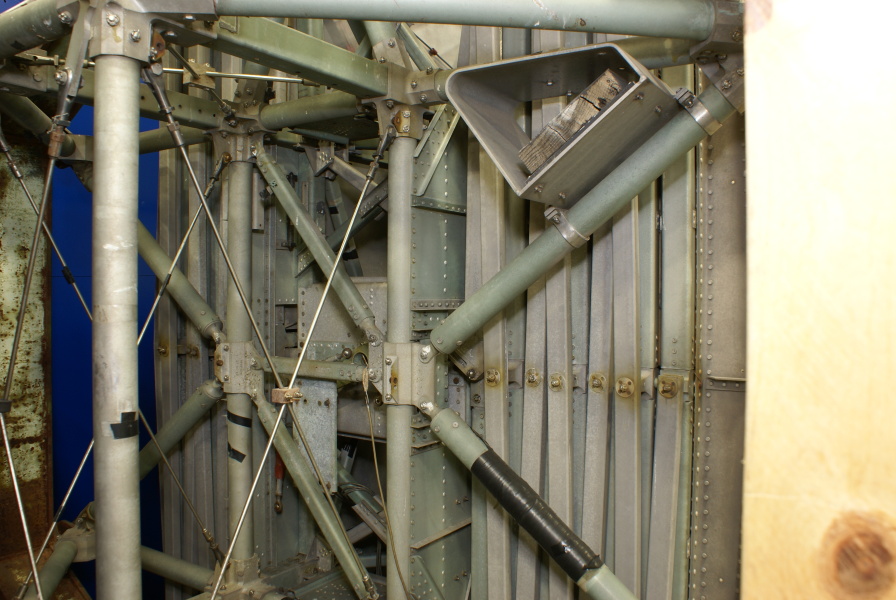 Center section and folded panels comprising wing assemblies of the Pegasus Micrometeoroid Satellite at Air Zoo