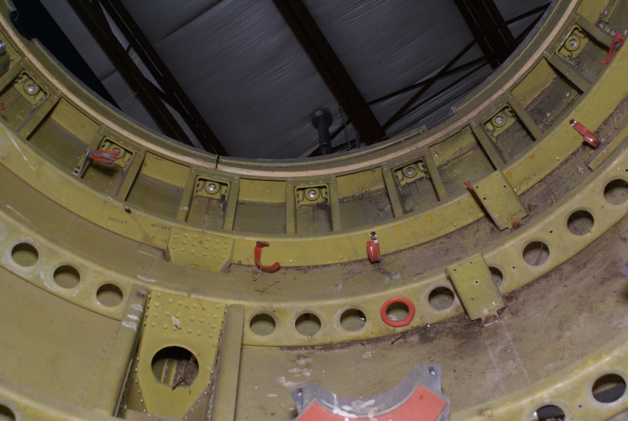 Redstone Tail Unit interior, including fin interface, triplex air storage sphere mounts, and hydrogen peroxide (h2o2) fill/drain valve at Air Zoo