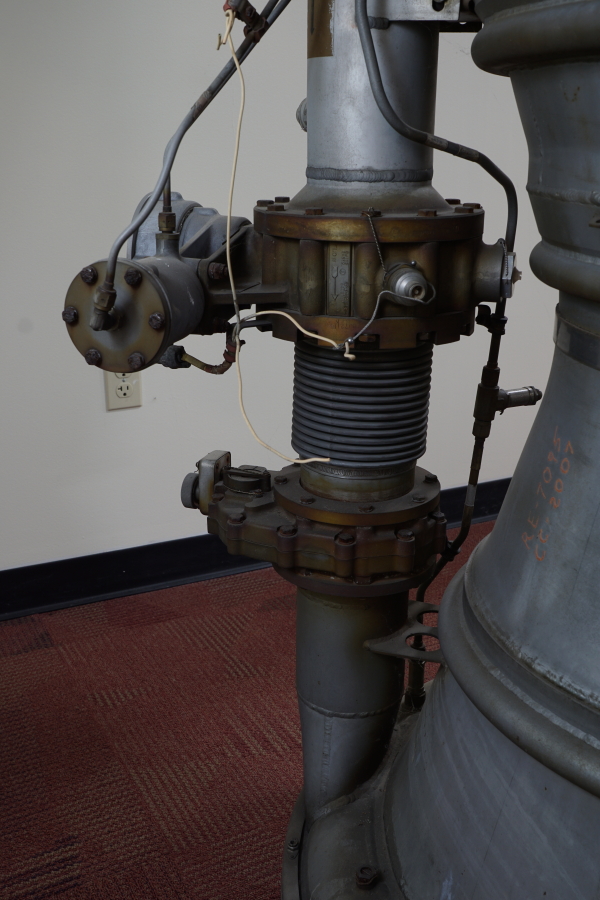 Main fuel valve, mixture control valve, and fuel inlet manifold on A-7 Engine ("As Removed") at Air Zoo