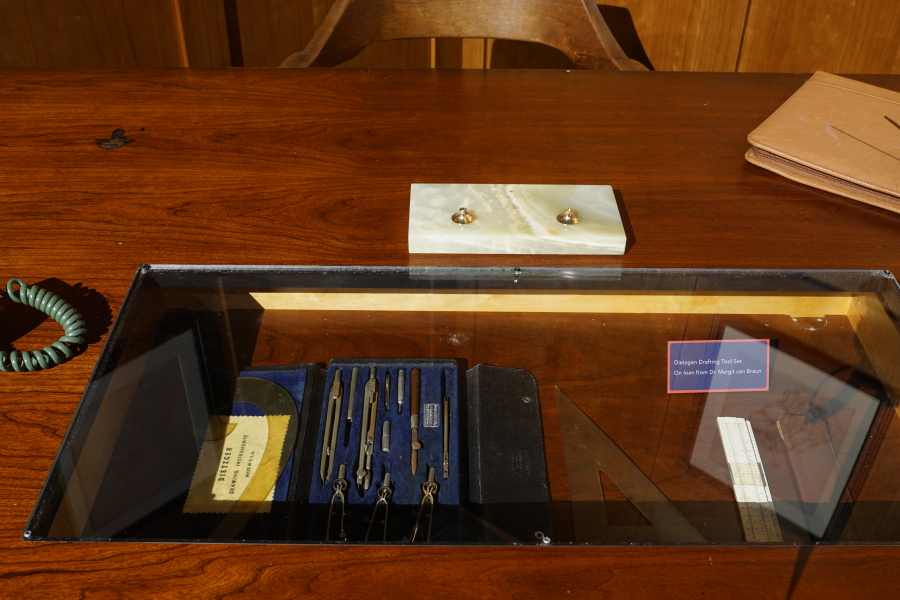 Drafting tools and slide rule in the von Braun desk in the Apollo:  When We Went to the Moon exhibit