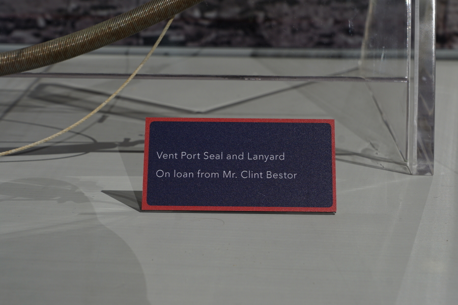 The sign accompanying the Saturn V S-II (second) stage vent port seal and lanyard in the Apollo:  When We Went to the Moon exhibit