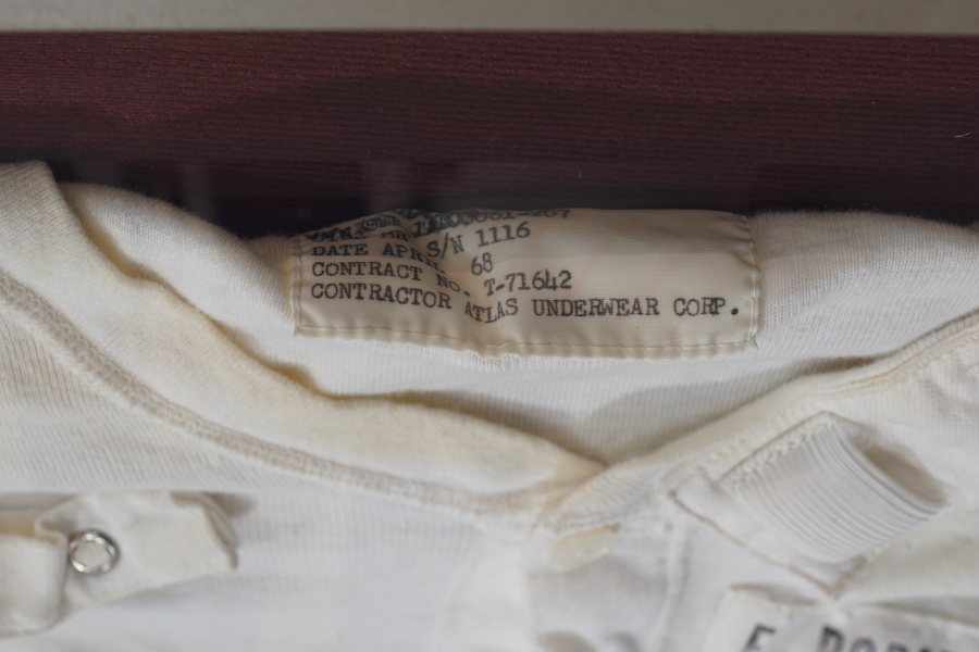 Manufacturer's tag on Borman's Apollo 8 Constant Wear Garment at Celebrating Apollo