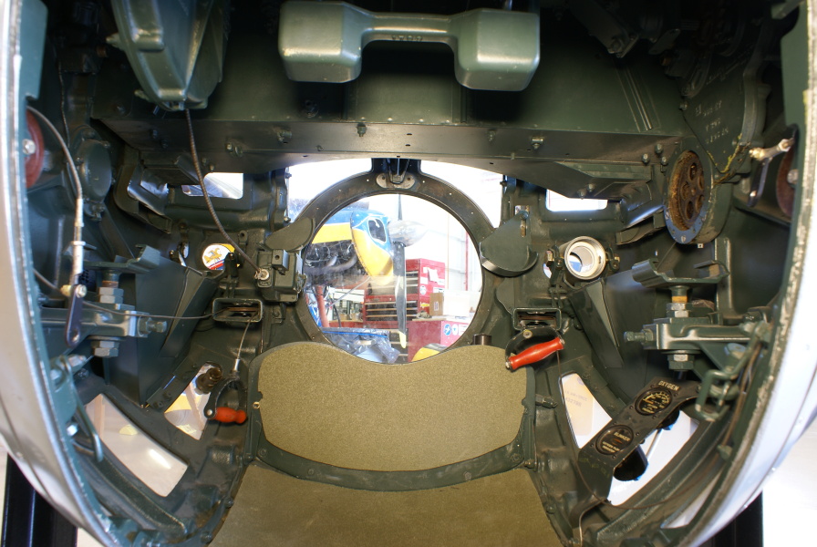 B-17 Ball Turret interior, including machine gun charging handles, at Champaign Aviation Museum