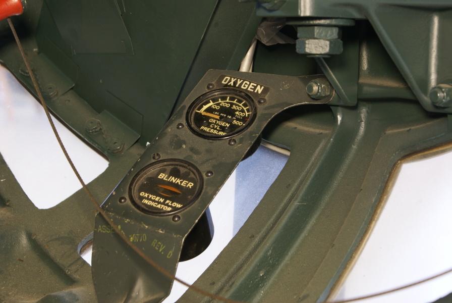 B-17 Ball Turret oxygen cylinder pressure gauge and oxygen flow indicator blinker at Champaign Aviation Museum