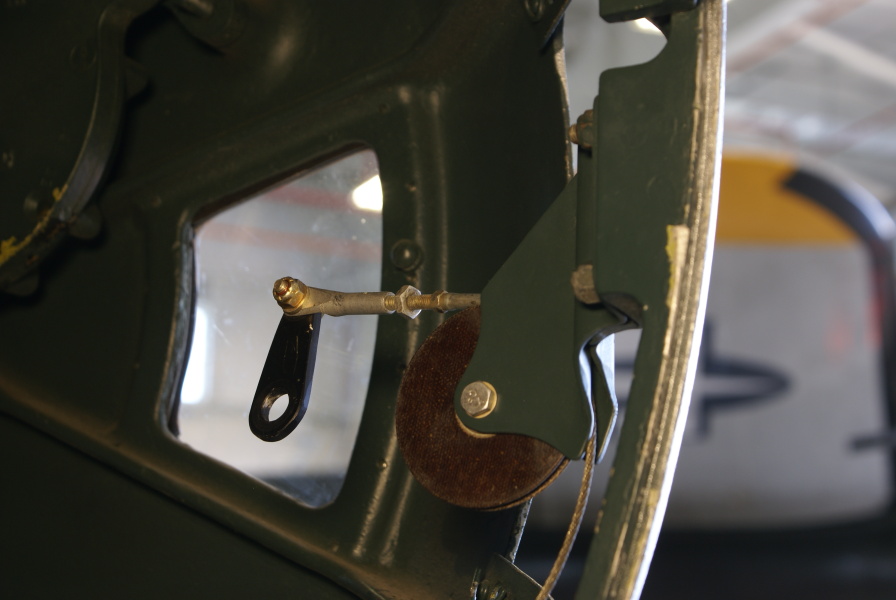 B-17 Ball Turret machine gun charging handle/cable bracket at Champaign Aviation Museum