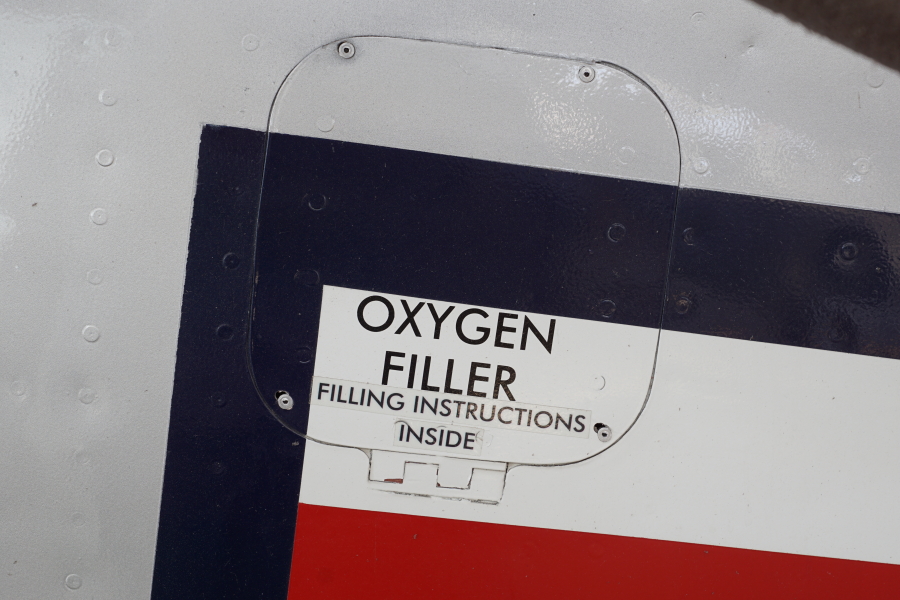Oxygen filler access panel on roundel on P-51H fuselage at Chanute Air Museum