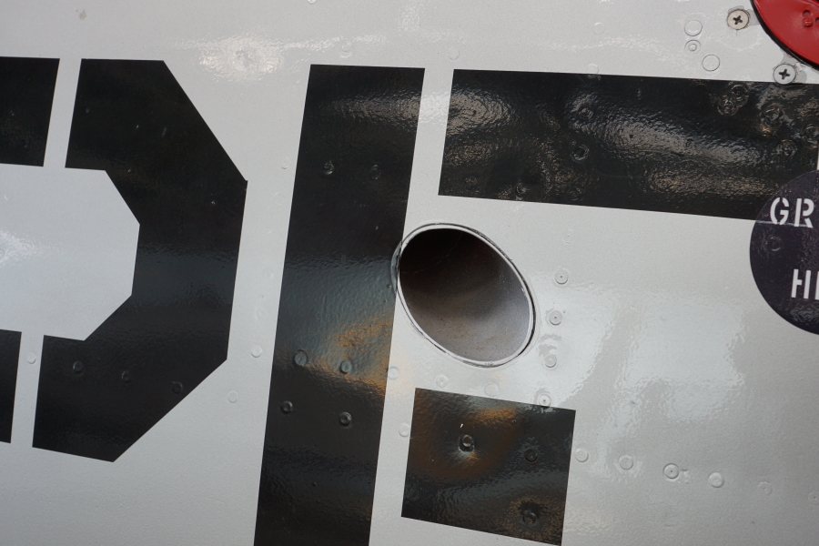 signal pistol discharge tube on port side of P-51H at Chanute Air Museum
