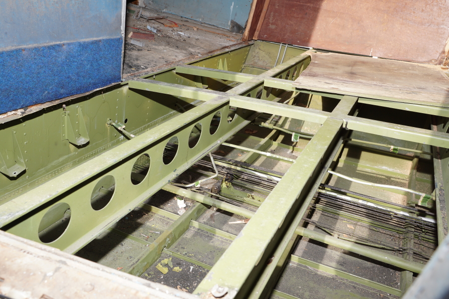 C-47 structure below the floorboards, including control cables, at Chanute Air Museum