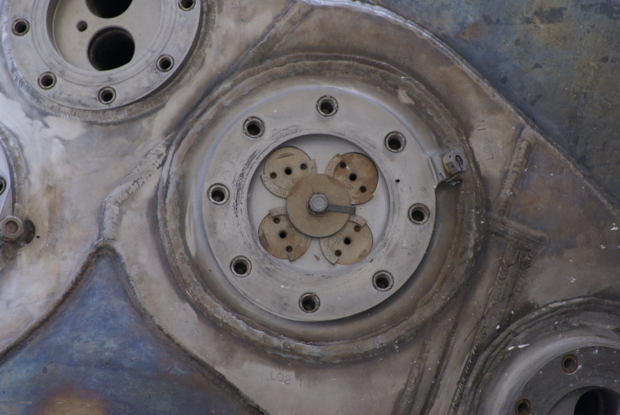 Liquid oxygen (LO2) inlet port on heat exchanger on F-1 Engine at Kansas Cosmosphere
