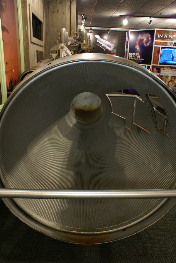 Cut-outs in regenerative cooling tubes in thrust chamber of Cut-Away H-1 Engine at Kansas Cosmosphere
