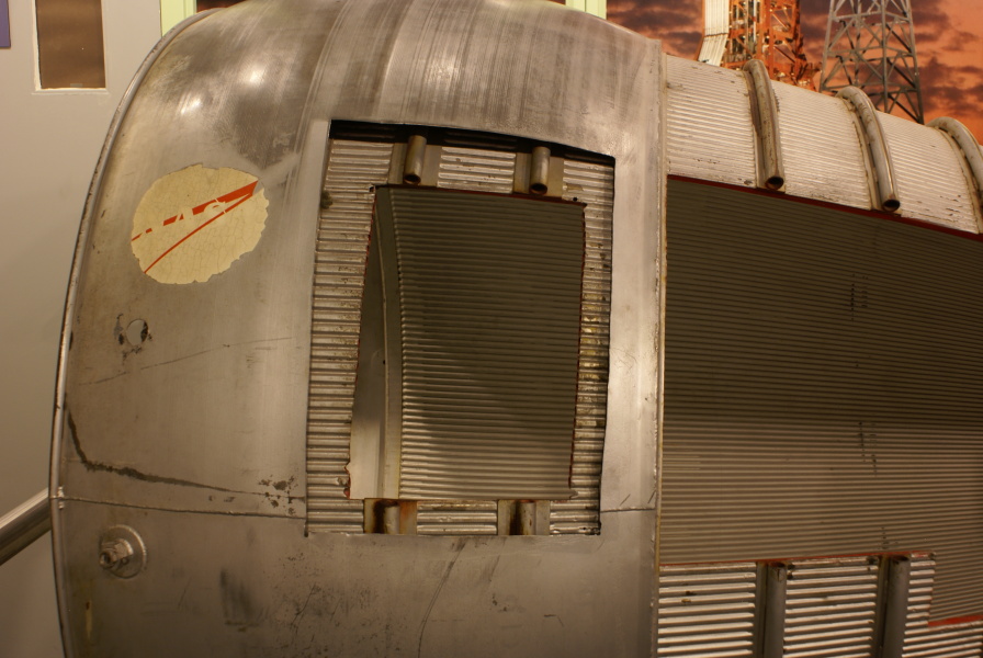 Cut-outs in regenerative cooling tubes in thrust chamber of Cut-Away H-1 Engine at Kansas Cosmosphere