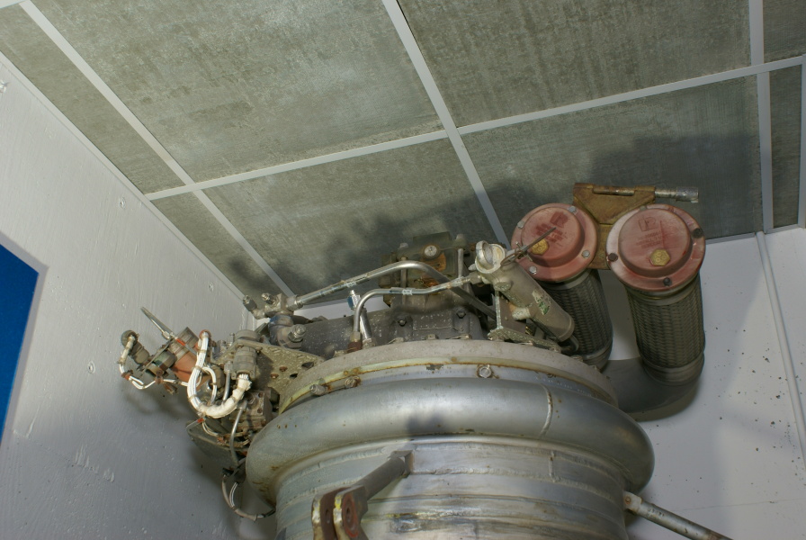 Forward end of LR-89 (Atlas Booster) Engine, including propellant (LOX/RP-1) high-pressure lines, hypergol manifold, fuel manifold, and gimbal bearing at Kansas Cosmosphere