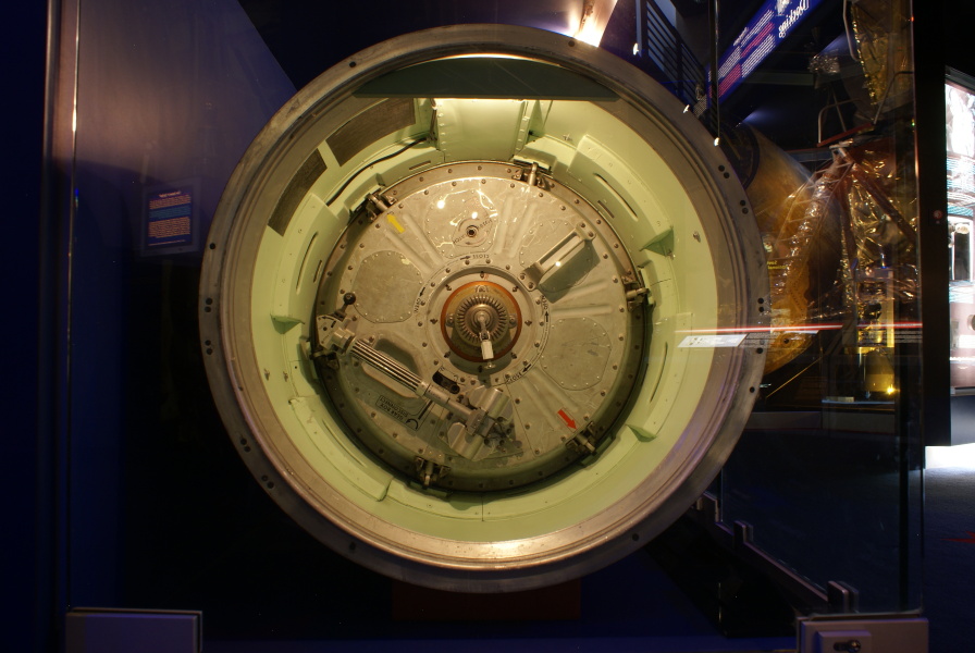 Command module forward tunnel hatch in Apollo Probe & Drogue System at Kansas Cosmosphere.
