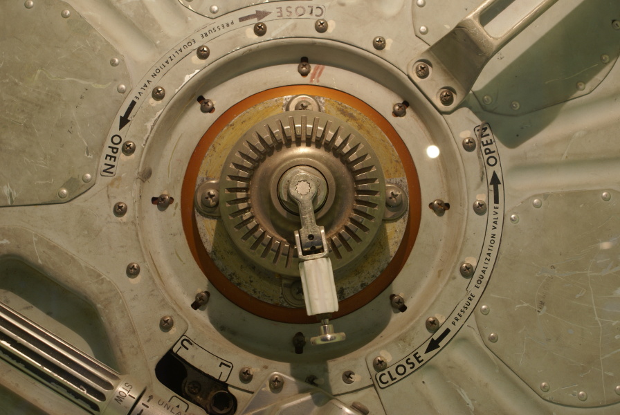 Pressure equalization valve on command module forward tunnel hatch in Apollo Probe & Drogue System at Kansas Cosmosphere.