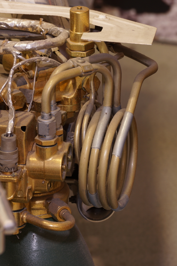 Coiled propellant supply lines on TD-339 vernier engine #1 on Surveyor Engineering Model at Kansas Cosmosphere