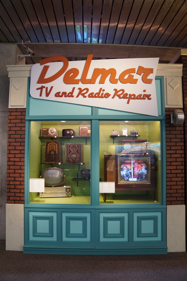 Delmar TV and Radio Repair store front in Destination Moon exhibit
