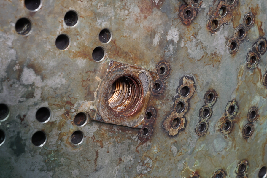 Aft face of injector plate from Jeff Bezos recovered F-1 Apollo 11 rocket engines, including oxidizer/LOX feed passages and inner dome attach bolt hole