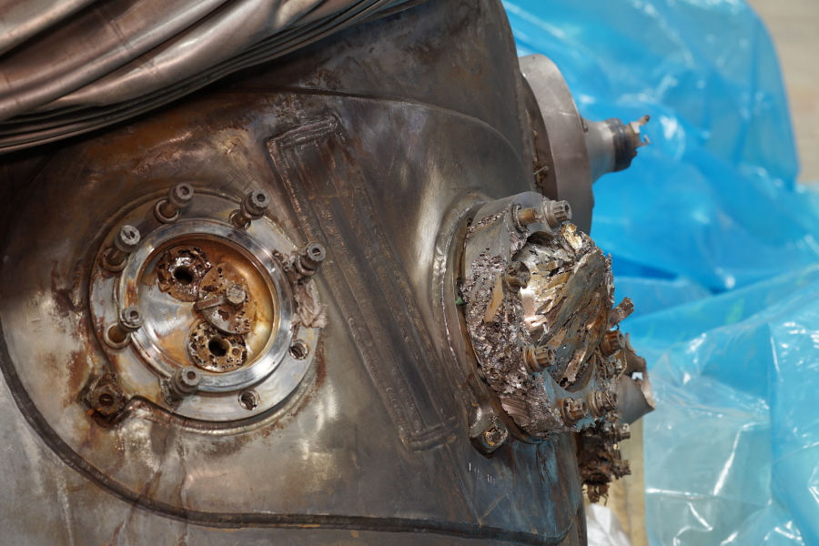 Heat exchanger inlet and outlet ports on Jeff Bezos recovered F-1 Apollo 11 rocket engines