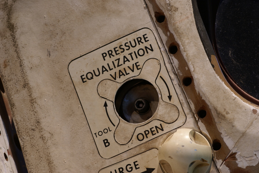 Pressure equalization valve on SL-3 (Skylab 2) hatch exterior at Great Lakes Science Center