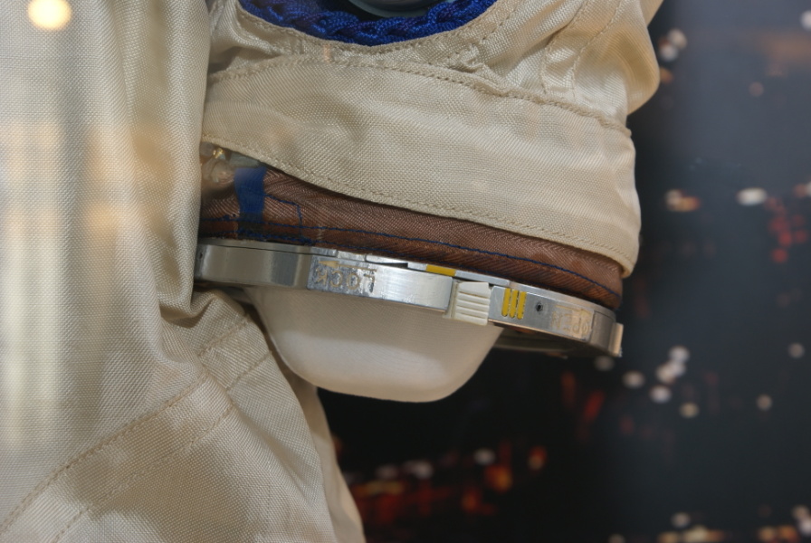 Left (silver-blue) wrist disconnect on Grissom's Gemini 3 Suit at Mitchell Indiana