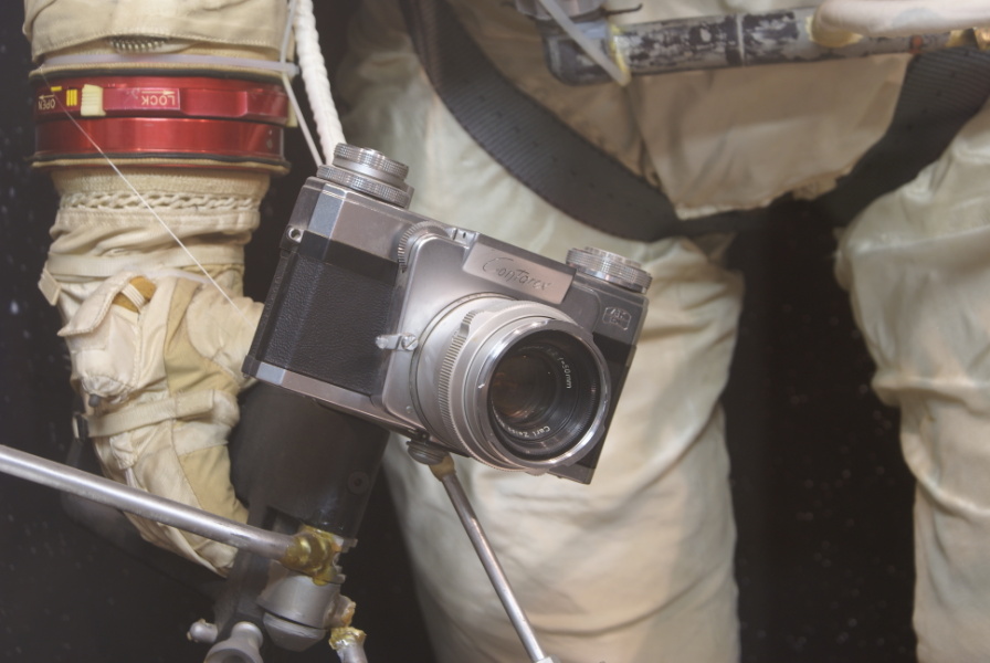 Camera on Gemini hand-held maneuvering unit held by Gemini G4C Suit at Houston Museum of Natural Science