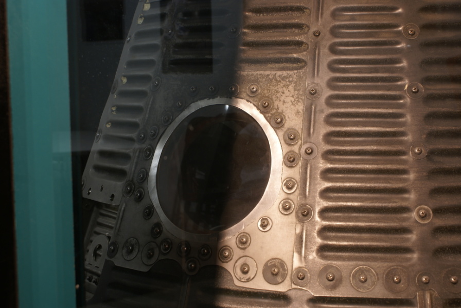 Round porthole window on Mercury MA-2 at Houston Museum of Natural Science