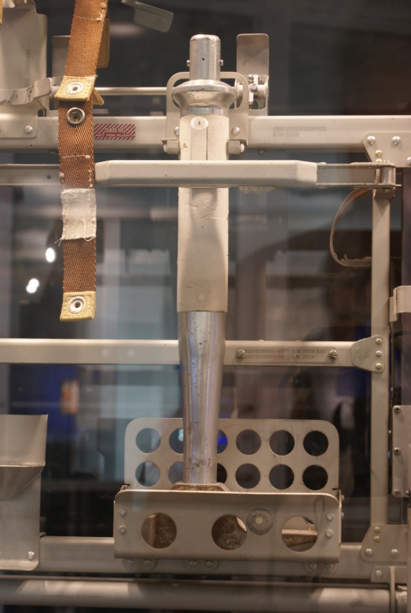 Lunar hammer stowed in Lunar Hand Tool Carrier at Houston Museum of Natural Science