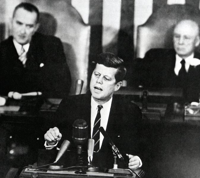 JFK John Kennedy urgent national needs speech I believe this nation
	 should commit itself to achieving the goal before this decade is out
	 of landing a man on the moon and returning him safely to the earth