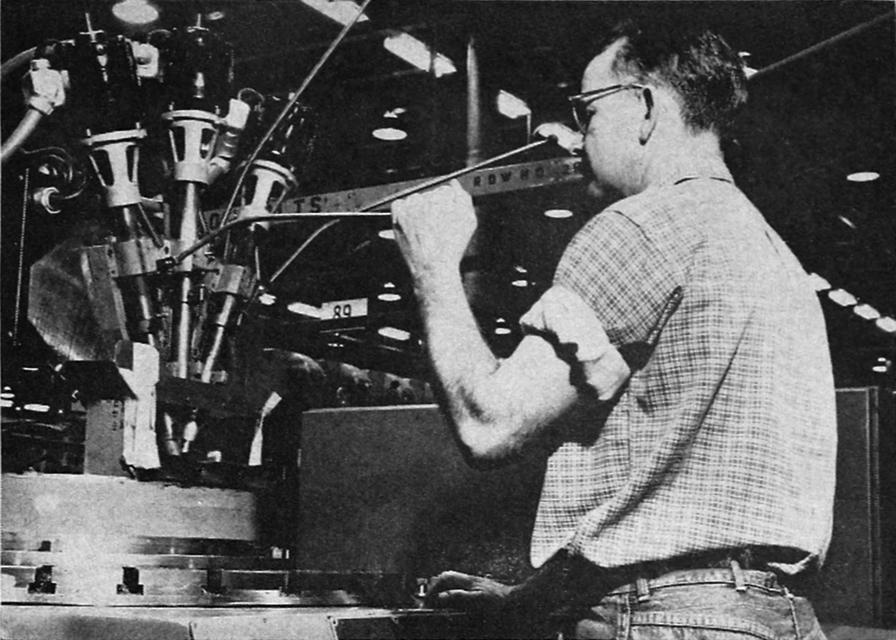 Drilling holes in Thor MB-3 rocket engine injector using automatic indexing at Rocketdyne Neosho Missouri