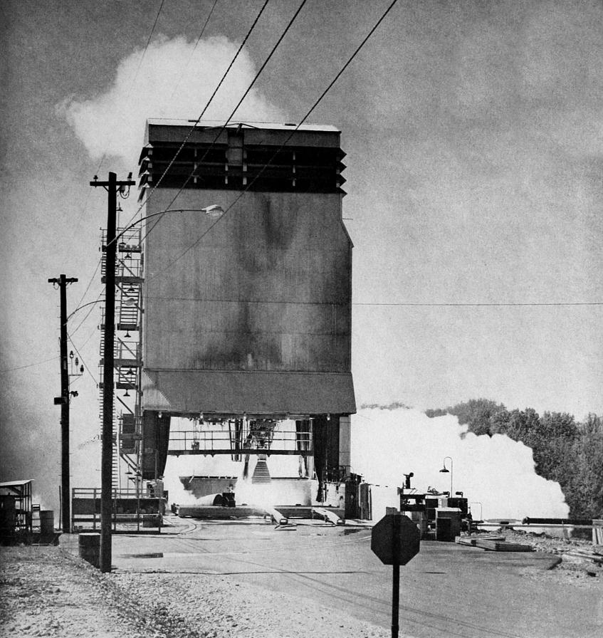 A static test firing of a Thor MB-3 rocket engine in Rocketdyne's Neosho Missouri test stand