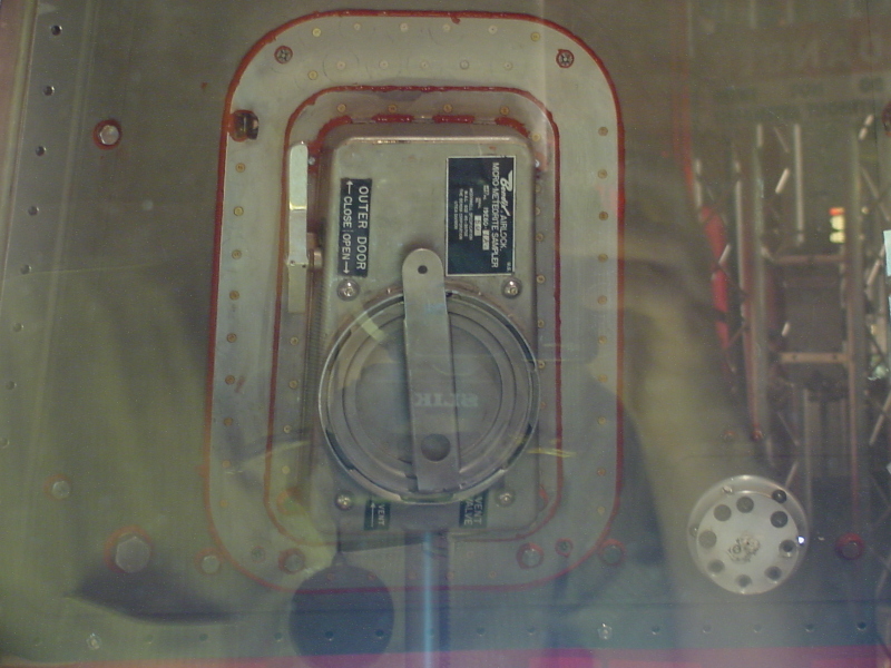 Micrometeorite sampler on interior of Mercury Hatch at Liberty Bell 7 Travelling Exhibit
