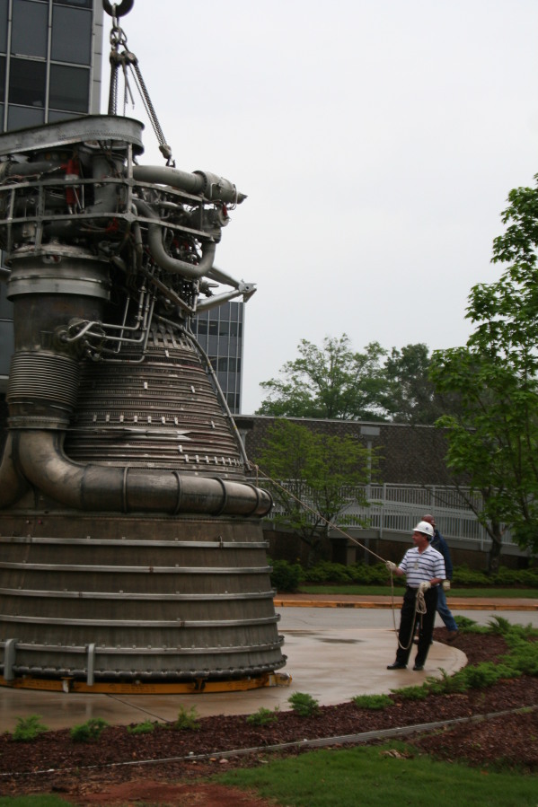 Preparing to lift F-1 rocket engine during Installation of Building 4200 Engines (May 13, 2008) at Marshall Space Flight Center Engine Displays
