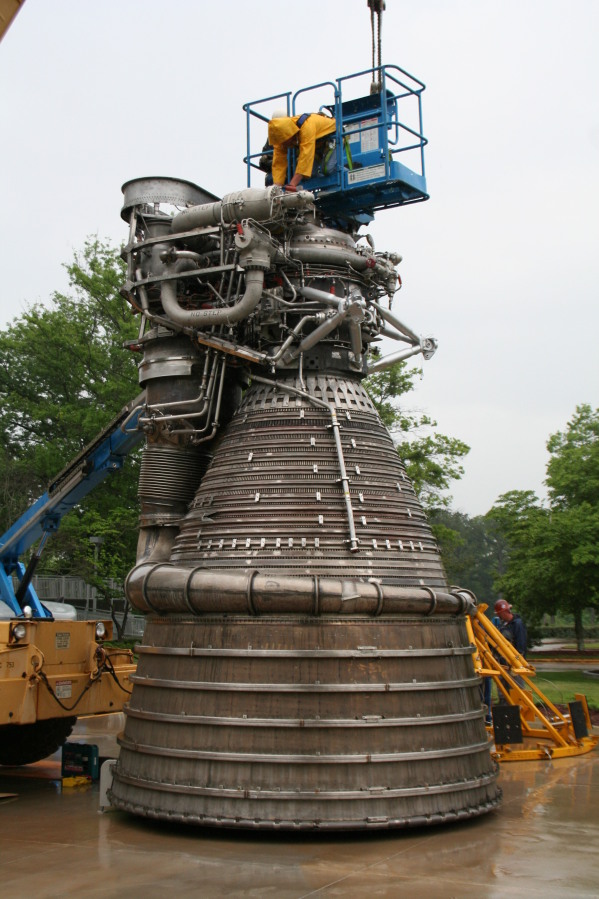 Removing crane hoist cable from F-1 rocket engine during Installation of Building 4200 Engines (May 13, 2008) at Marshall Space Flight Center Engine Displays