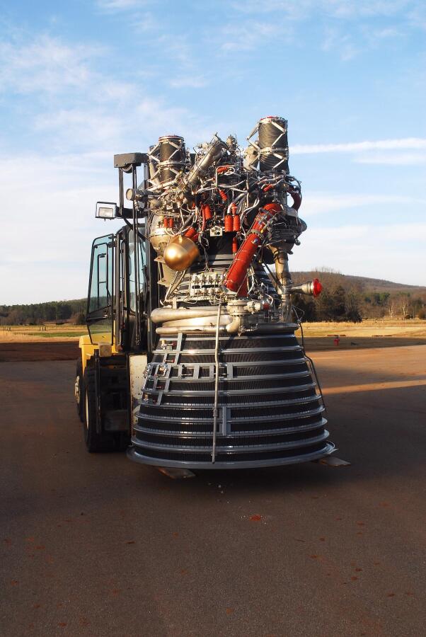 Relocating the J-2 rocket engine to the north end of the lot behind Building 4205 during Building 4200 J-2 Engine Relocation (March 6, 2008) at Marshall Space Flight Center Engine Displays