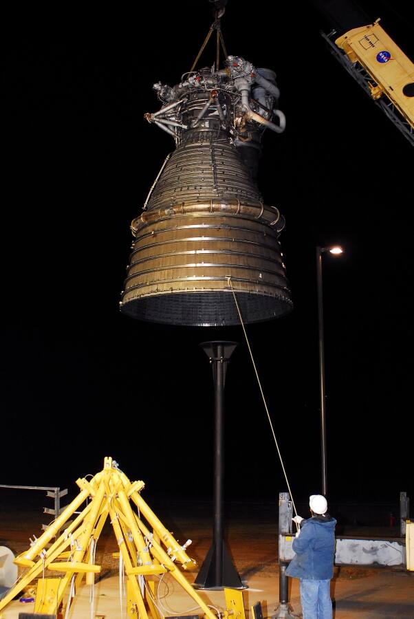 Lifting the F-1 rocket engine onto its throat support during F-5036 Fit Test (March 6, 2008) at Marshall Space Flight Center Engine Displays