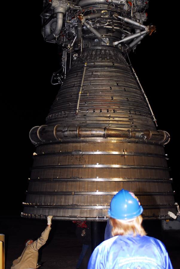 Lowering the F-1 rocket engine onto its throat support during F-5036 Fit Test (March 6, 2008) at Marshall Space Flight Center Engine Displays