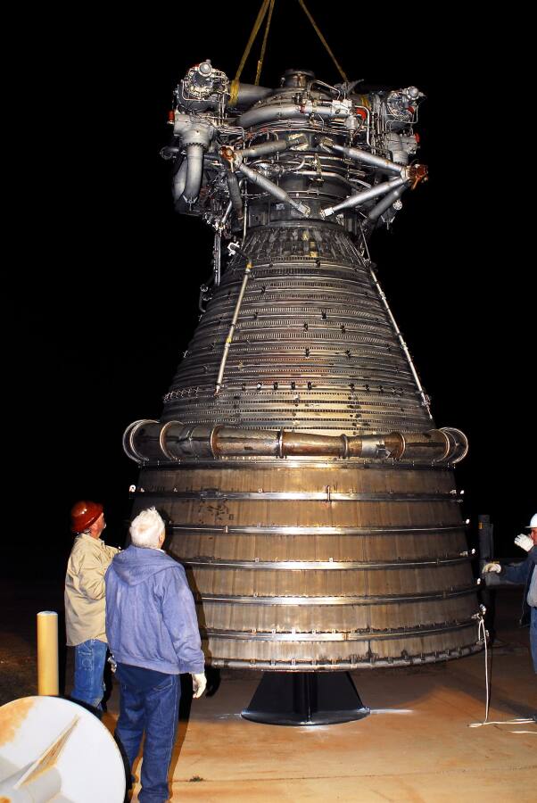 Lowering the F-1 rocket engine onto its throat support during F-5036 Fit Test (March 6, 2008) at Marshall Space Flight Center Engine Displays