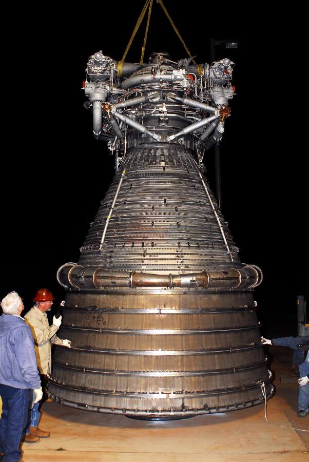 Lowering the F-1 rocket engine onto its throat support during F-5036 Fit Test (March 6, 2008) at Marshall Space Flight Center Engine Displays