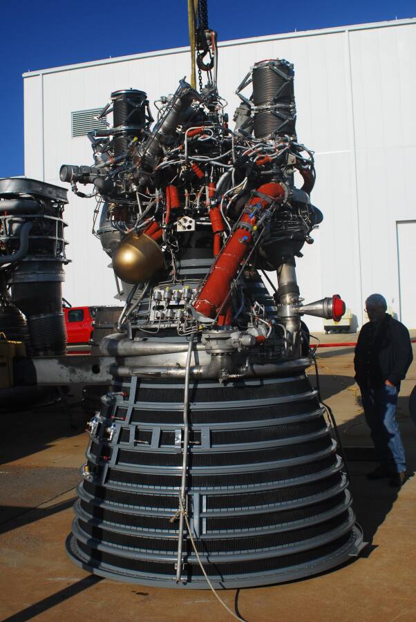 J-2 rocket engine resting on its throat support during Building 4200 J-2 Engine Fit Test (March 24, 2008) at Marshall Space Flight Center Engine Displays
