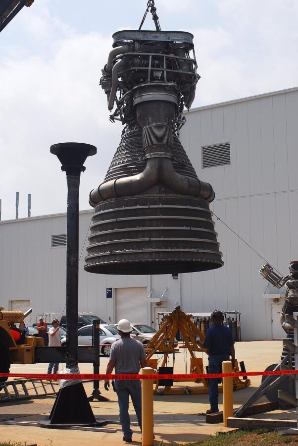F-1 rocket engine being placed on its throat support during F-5036 Fit Test (April 7, 2008) at Marshall Space Flight Center Engine Displays