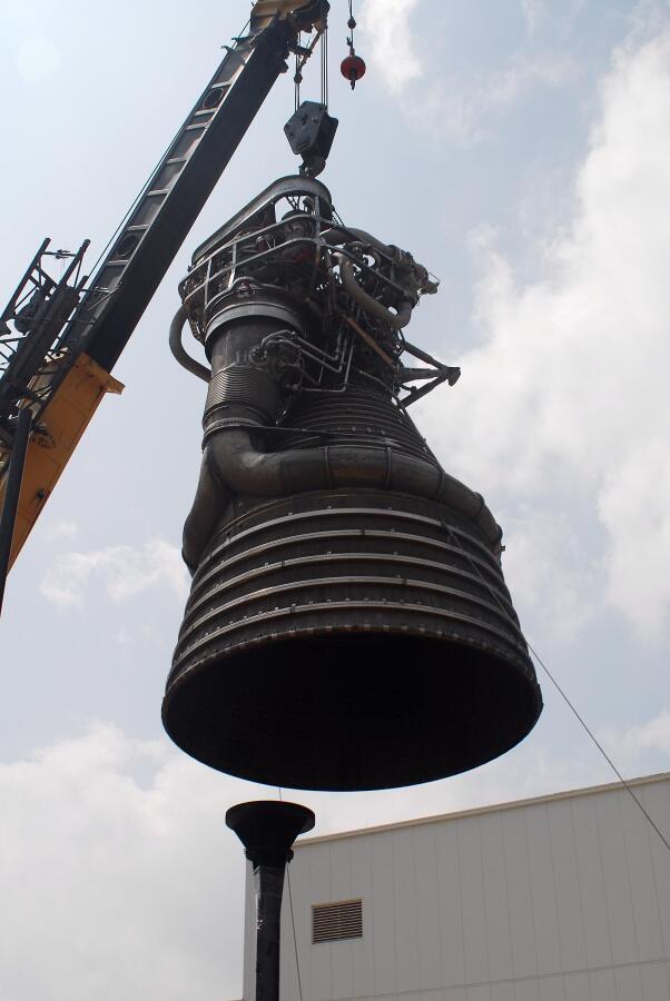 F-1 rocket engine being placed on its throat support during F-5036 Fit Test (April 7, 2008) at Marshall Space Flight Center Engine Displays