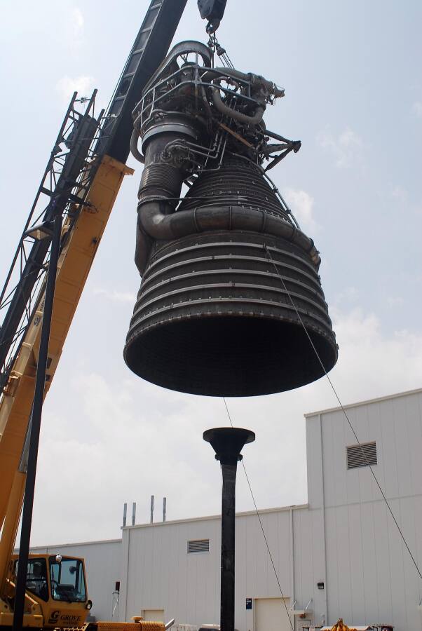 F-1 rocket engine being placed on its throat support during F-5036 Fit Test (April 7, 2008) at Marshall Space Flight Center Engine Displays