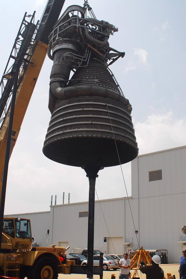 F-1 rocket engine being placed on its throat support during F-5036 Fit Test (April 7, 2008) at Marshall Space Flight Center Engine Displays