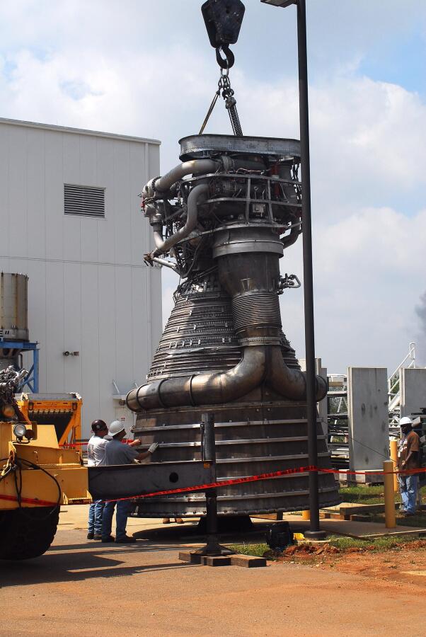 F-1 rocket engine being placed on its throat support during F-5036 Fit Test (April 7, 2008) at Marshall Space Flight Center Engine Displays