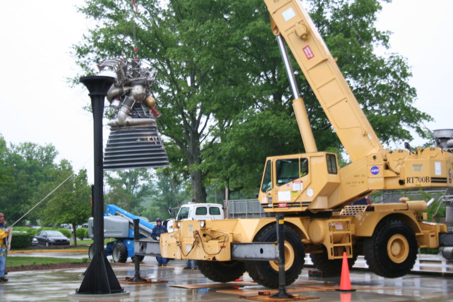 Placing J-2 rocket engine on throat support during Installation of Building 4200 Engines (May 13, 2008) at Marshall Space Flight Center Engine Displays