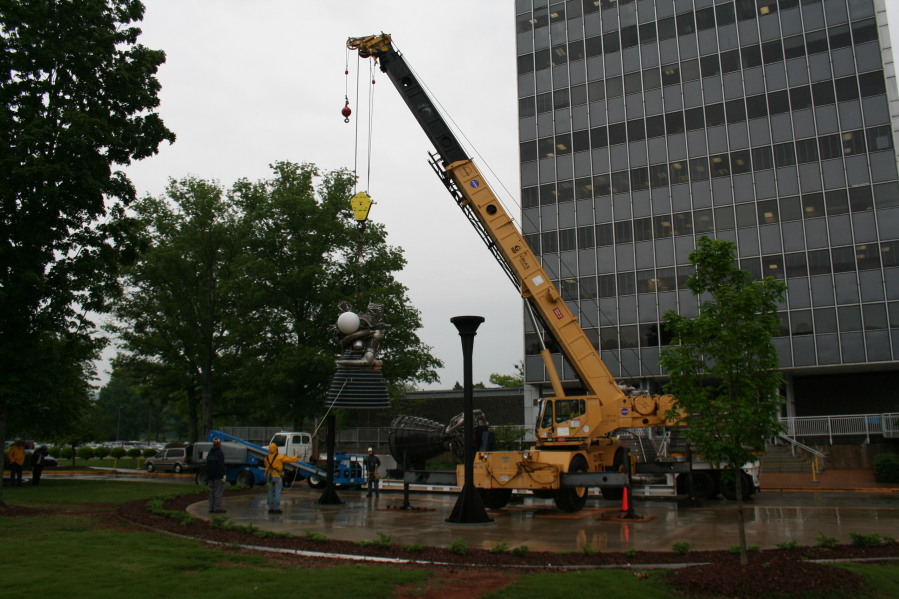 Placing J-2 rocket engine on throat support during Installation of Building 4200 Engines (May 13, 2008) at Marshall Space Flight Center Engine Displays