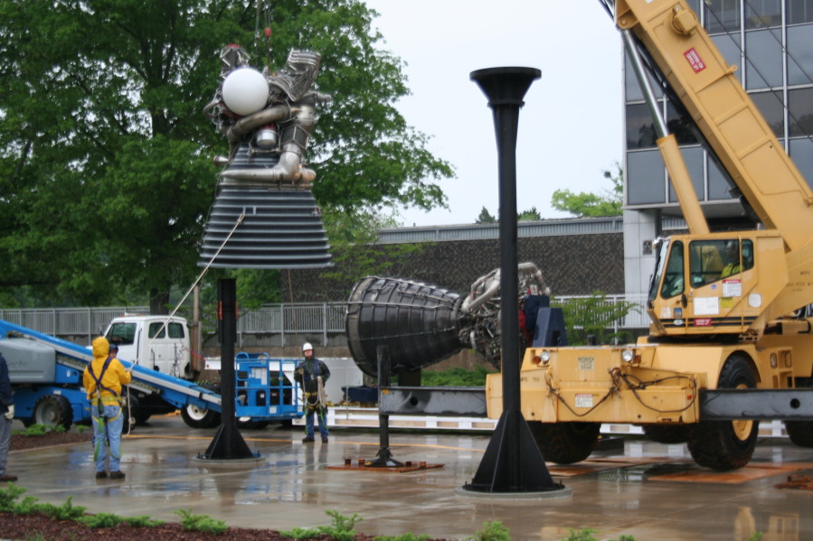 Placing J-2 rocket engine on throat support during Installation of Building 4200 Engines (May 13, 2008) at Marshall Space Flight Center Engine Displays